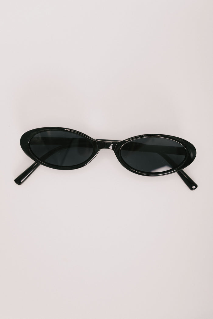 black oval sunglasses