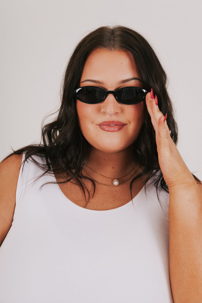 black oval sunglasses