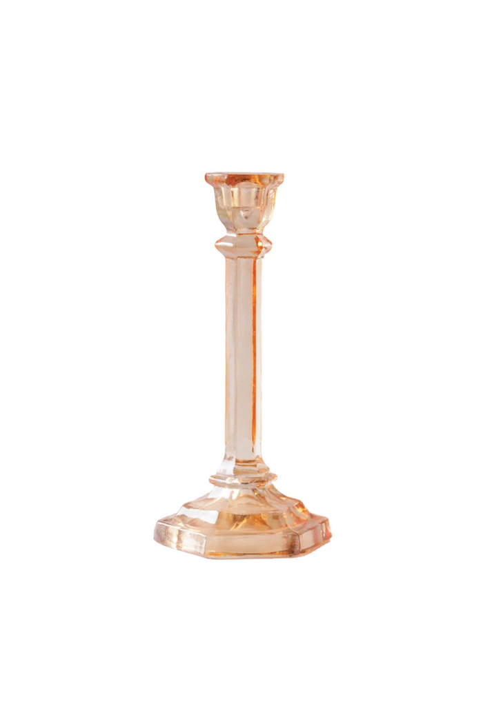 A tall amber-colored recycled glass taper holder with a round base and a narrow neck, suitable for displaying taper candles.