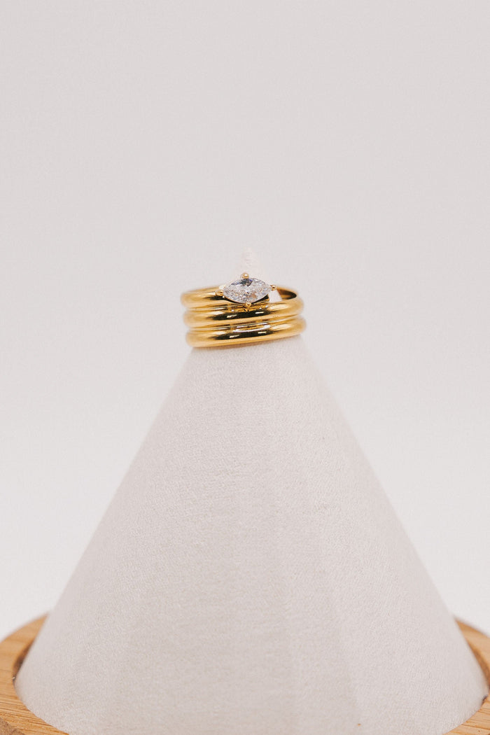 Wrapped layered 18k gold plated ring with oval diamond pendant