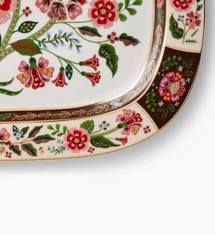 Decorative platter with floral patterns on a white background