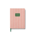 Softcover notebook with pink and white striped cover with lace design and green label