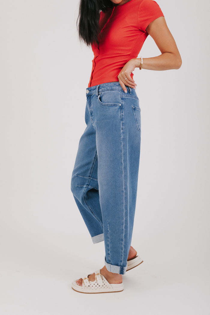 medium wash textured barrel jeans side