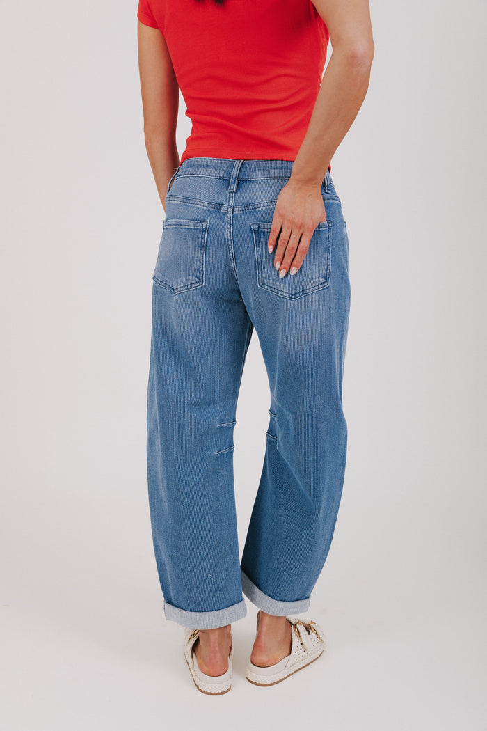 medium wash textured barrel jeans back