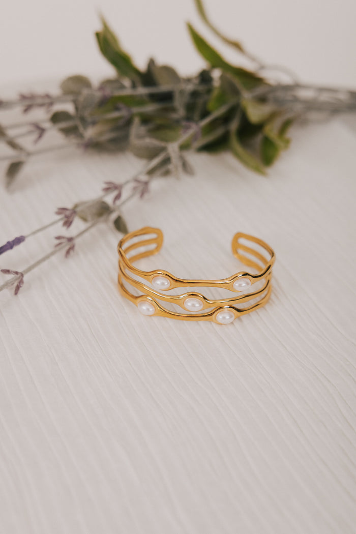 cuff style bracelet with pearls