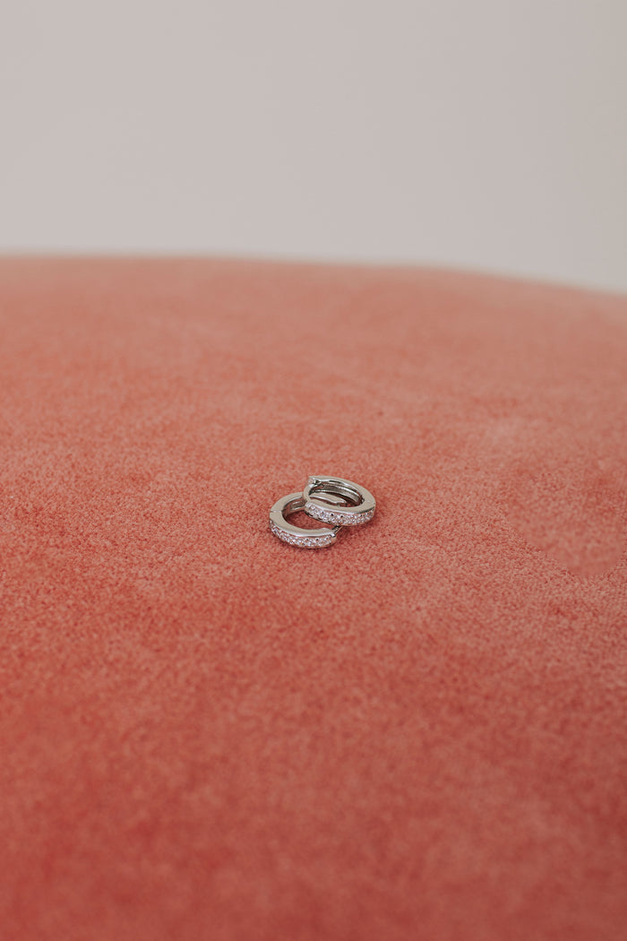 cubic zirconia hoop earring silver medium flatlay