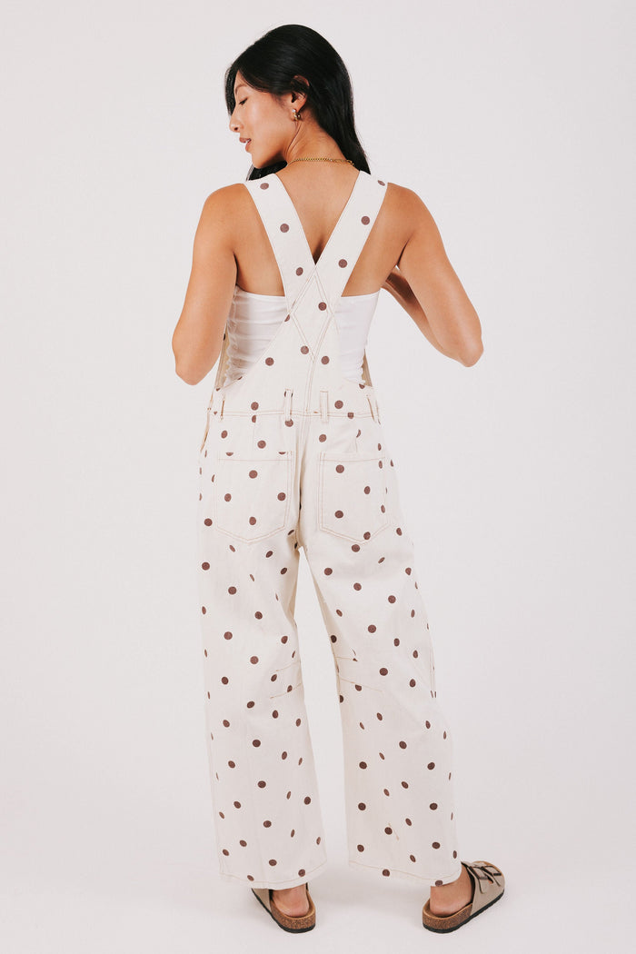 cream overalls with brown polka dots back