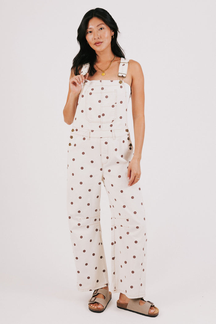 cream overalls with brown polka dots full
