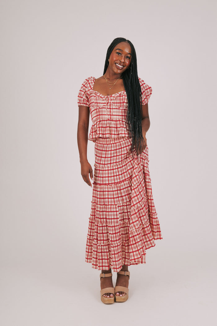 red plaid peplum top with puffed sleeves