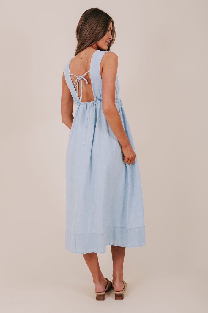 light blue denim bow tied midi dress back
