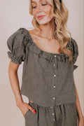 black gingham ruffled blouse front