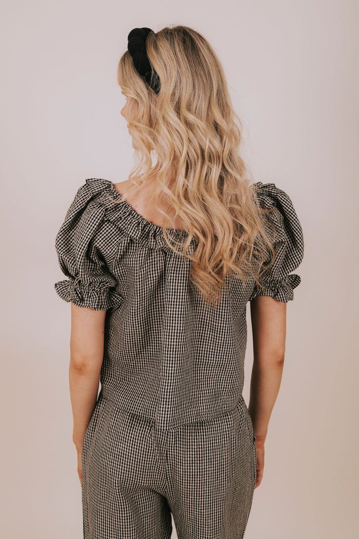 black gingham ruffled blouse back