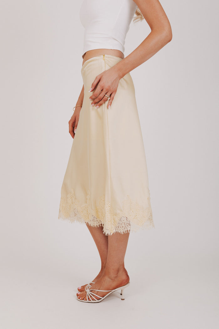 butter yellow satin midi skirt with lace trim side