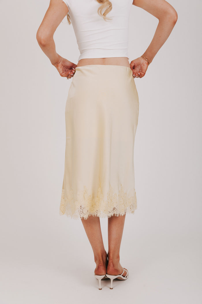 butter yellow satin midi skirt with lace trim back