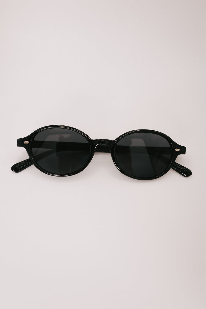 solid black sunglasses display