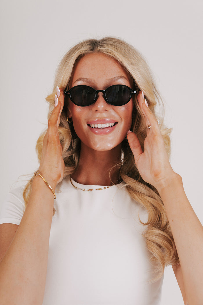 solid black sunglasses model