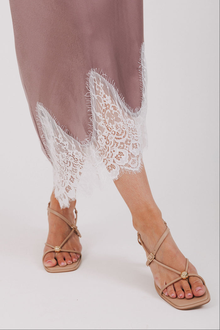 purple satin skirt with lace hem close