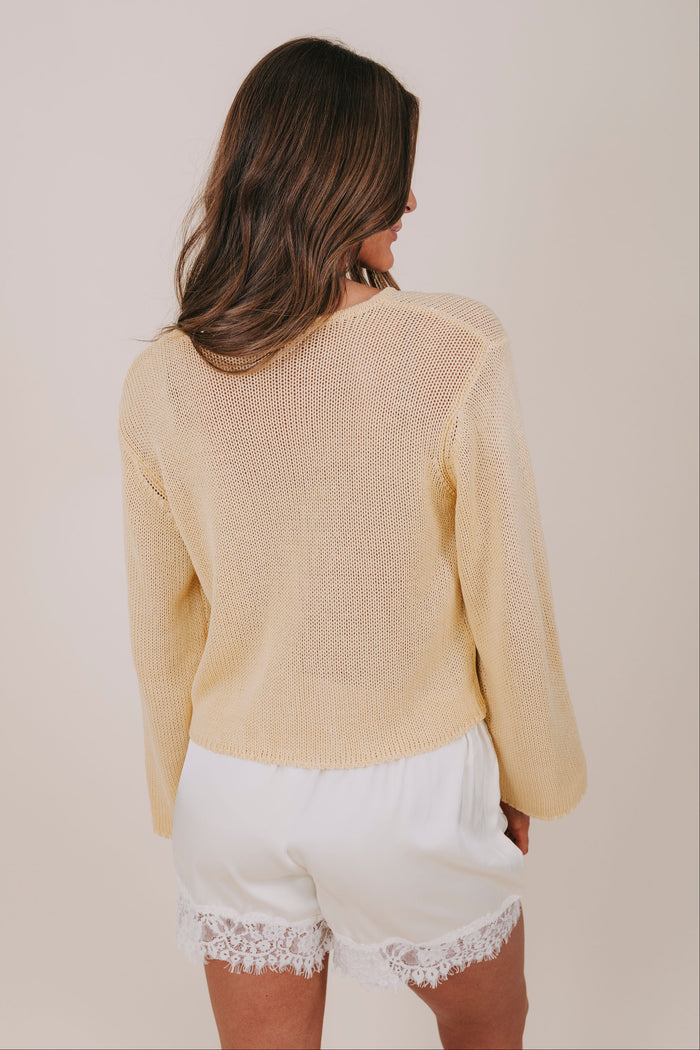 yellow button down knit cardigan back