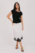 black and white polka dot satin skirt with lace hem