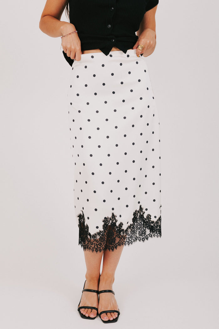 black and white polka dot satin skirt with lace hem