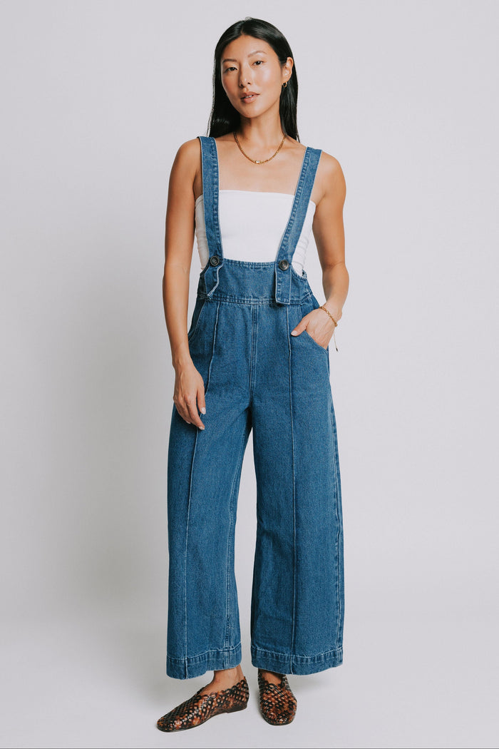denim suspender jumpsuit with seamed detailing