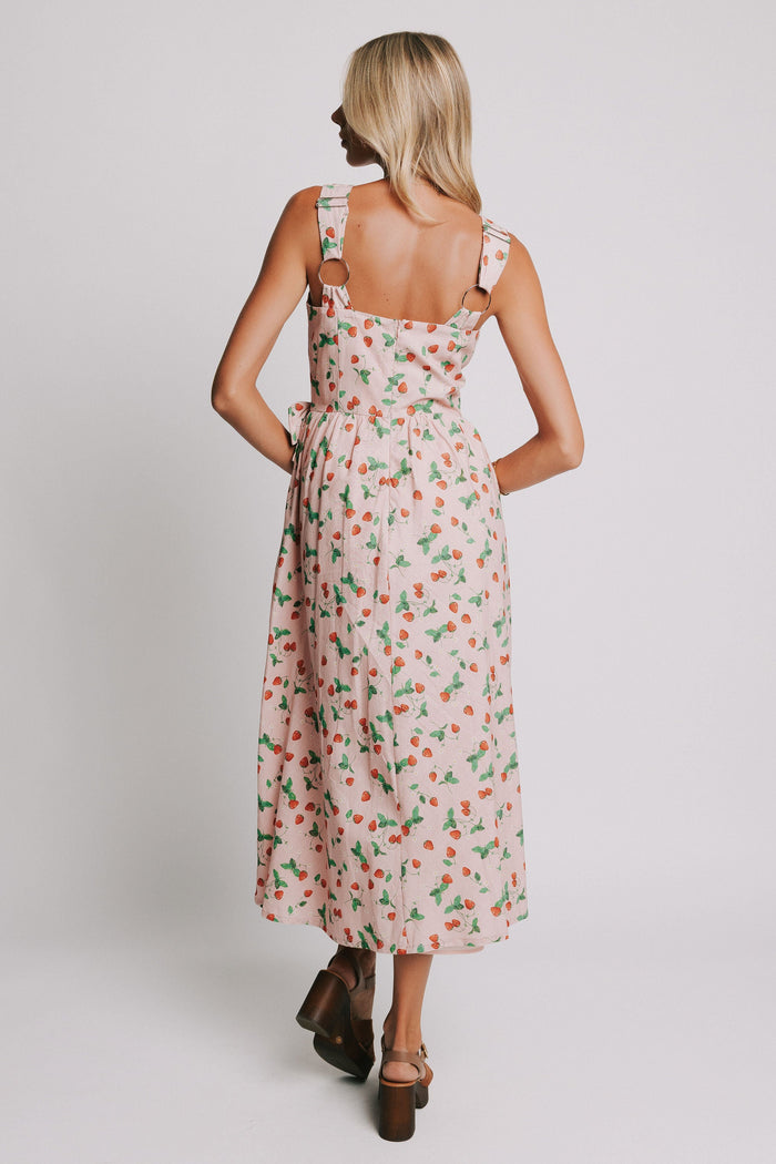 pink v neck maxi dress with strawberry print and bow details back