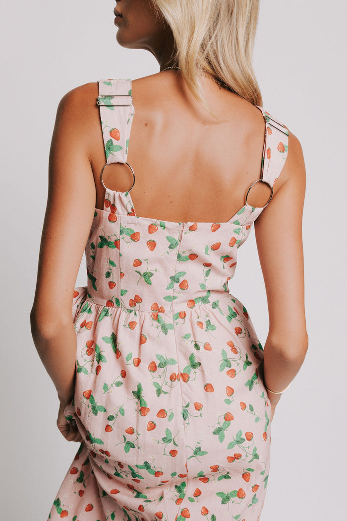 pink v neck maxi dress with strawberry print and bow details