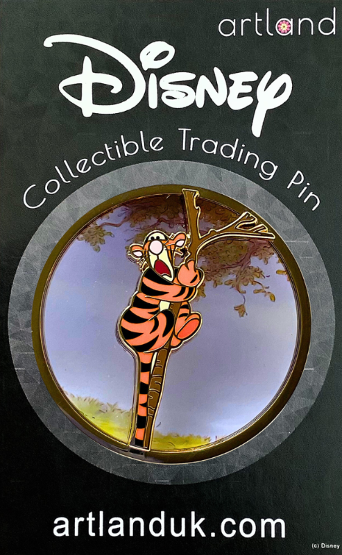 A pin-on-glass featuring Tigger from Winnie the Pooh stuck up a tree.