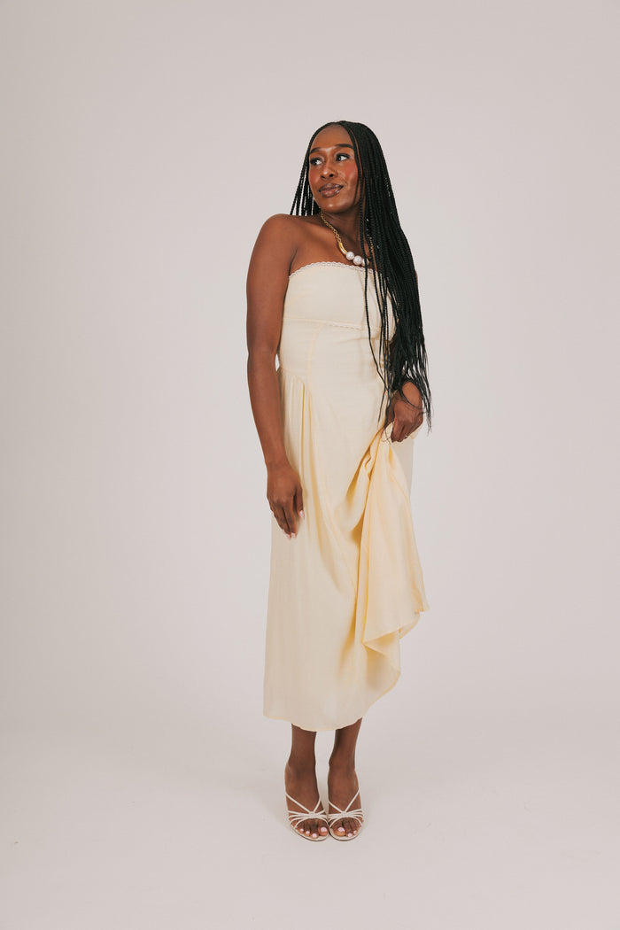 yellow strapless dress model