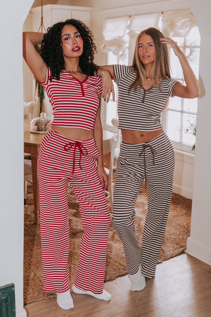 Striped wide leg lounge pants with an elastic waistband and tied bow