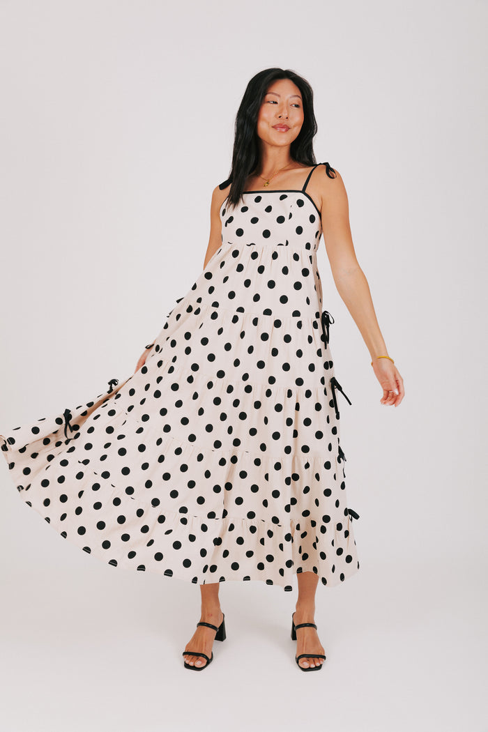 cream and black polka dot dress with bow details full