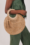 circular woven bag with tassels