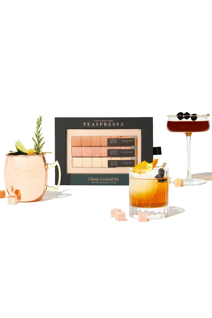 Teaspressa classic cocktail kit with glasses of each cocktail flavor.