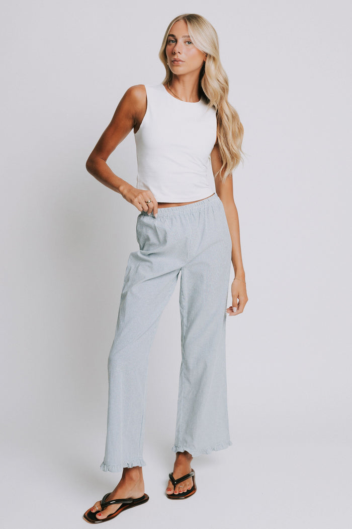 blue and white striped pants with elastic waist and ruffled hem full