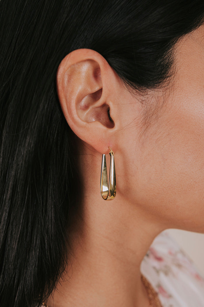 gold elongated tapered latch back earrings