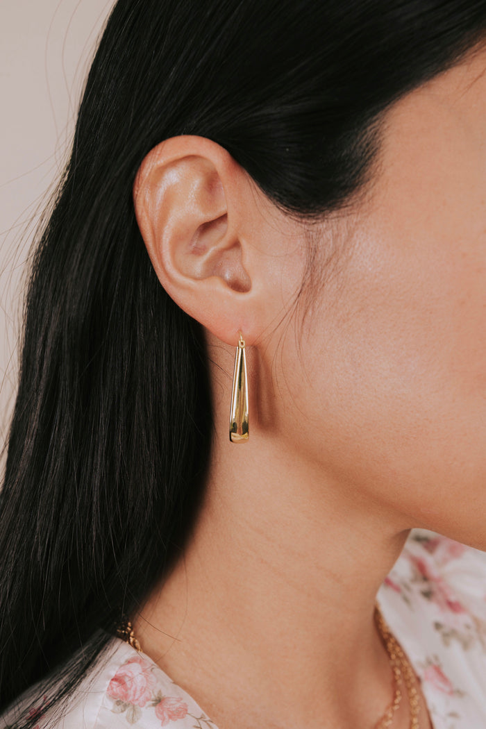 gold elongated tapered latch back earrings front