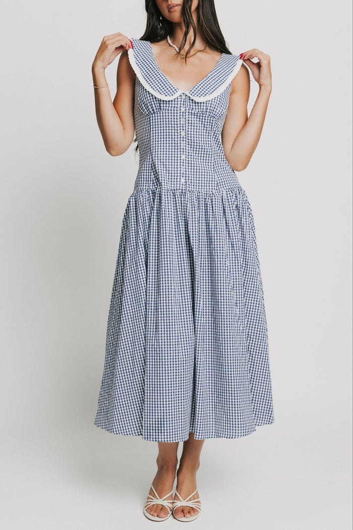 sleeveless blue and white gingham drop waist dress with collar