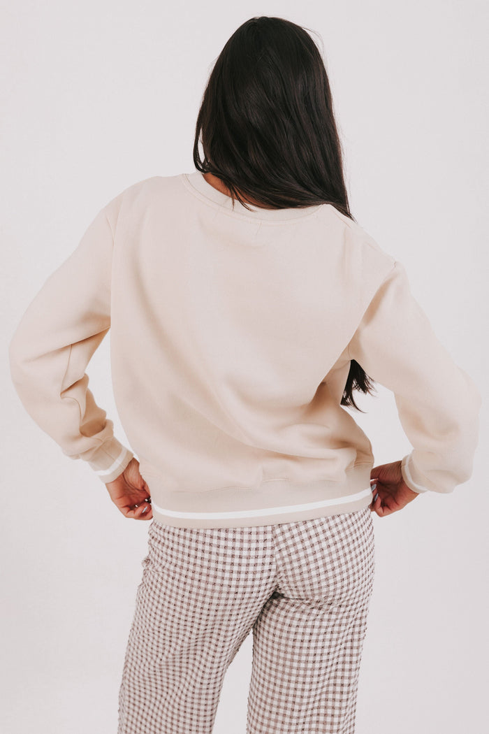 tan sweatshirt with mother printed back