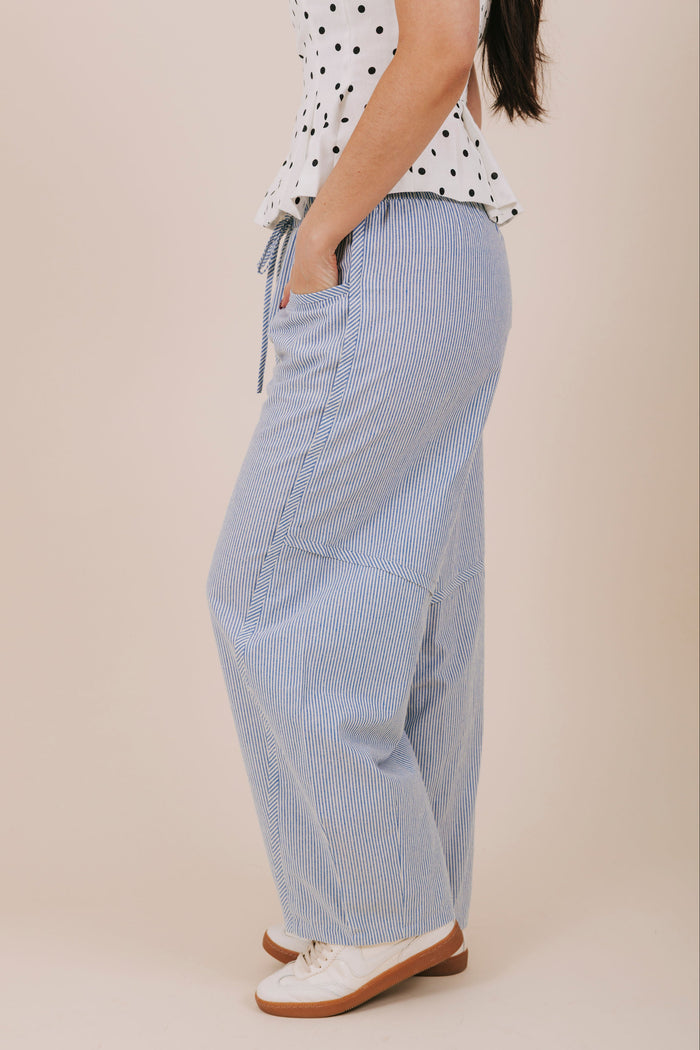 blue vertical stripe barrel cut pants side