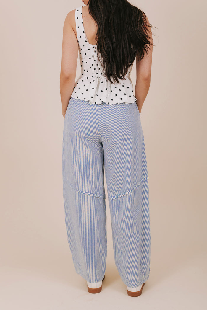 blue vertical stripe barrel cut pants back