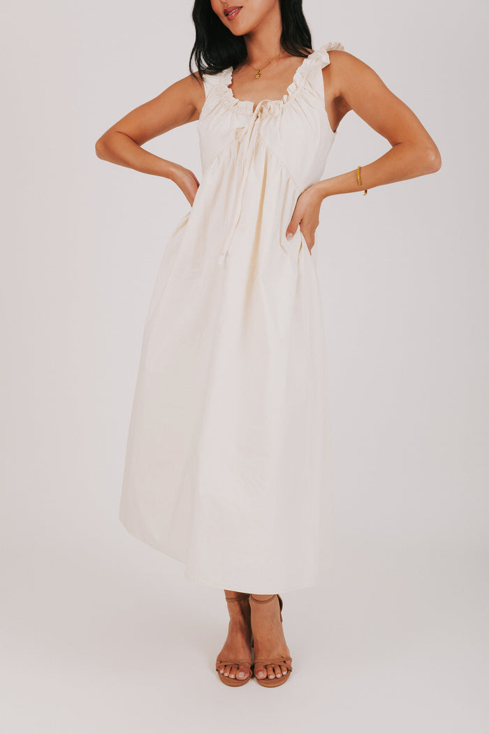ruffled trim sleeveless cream dress