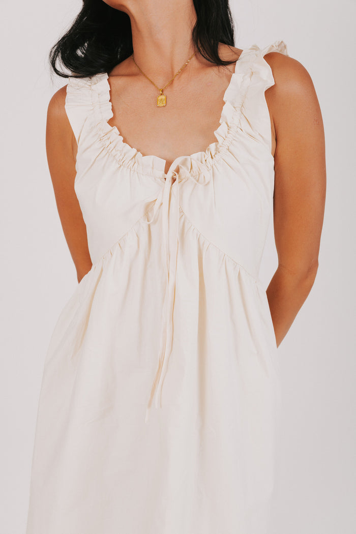 ruffled trim sleeveless cream dress