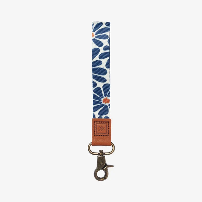 Navy floral patterned strap with brown leather end and metal clasp by Thread