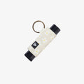 Thread brand elastic lip balm holder in Luna Beige.