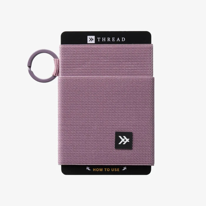 Thread brand elastic wallet with key ring in mauve.