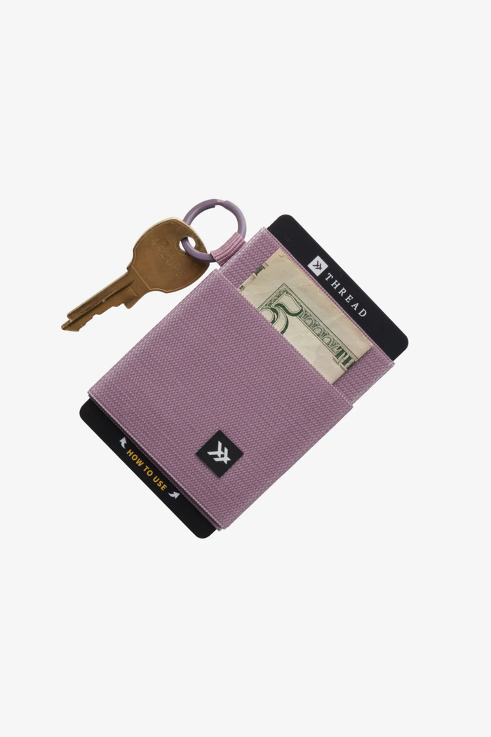 Thread brand elastic wallet with key ring in mauve.