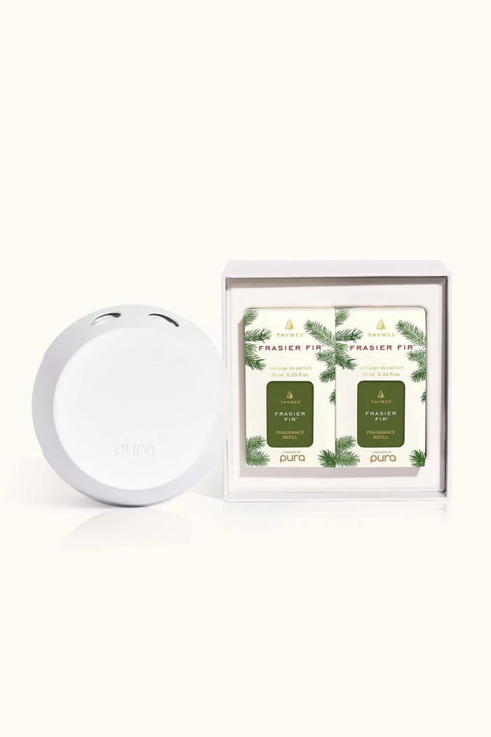 Pura air freshener with packaging on a white background