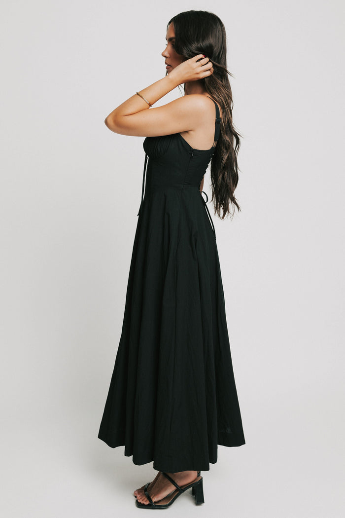 maxi dress with structured bodice and slit in the front black side