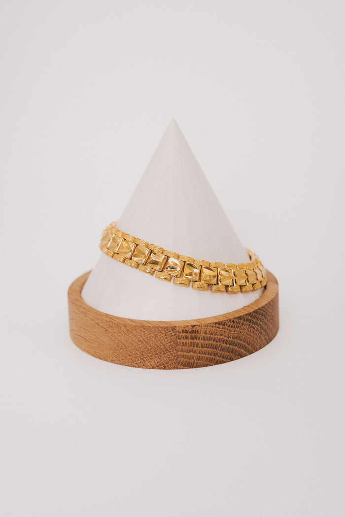 Gold plated link bracelet with texturing and hearts