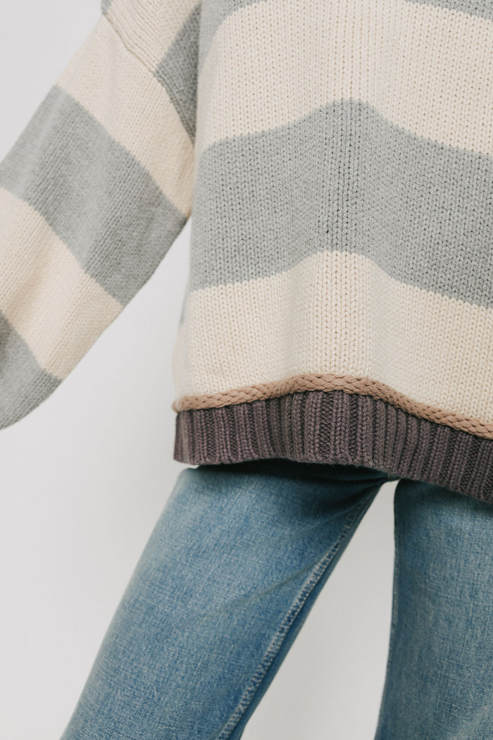 cream and grey wide striped sweater close